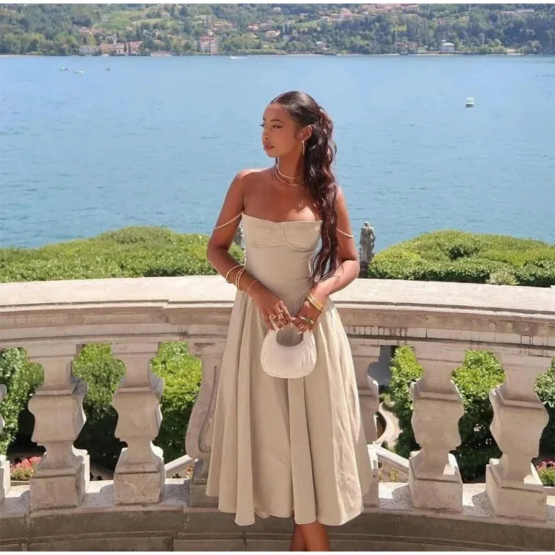 Robe mi-longue élégante à bretelles spaghetti pour femme, tenue d'été sexy, dos nu, sans manches, avec grandes poches et ourlet, à la mode, pour soirées et clubs 