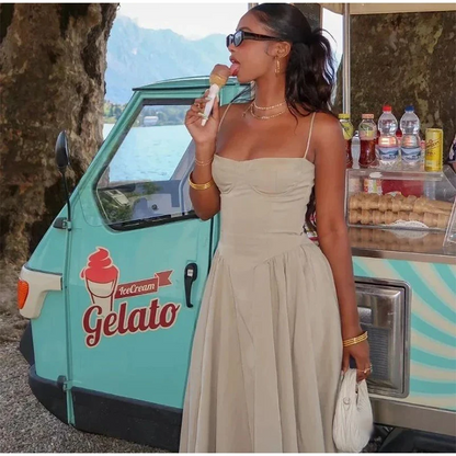 Robe mi-longue élégante à bretelles spaghetti pour femme, tenue d'été sexy, dos nu, sans manches, avec grandes poches et ourlet, à la mode, pour soirées et clubs 