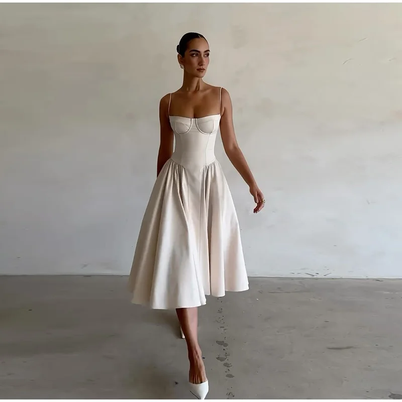 Robe mi-longue élégante à bretelles spaghetti pour femme, tenue d'été sexy, dos nu, sans manches, avec grandes poches et ourlet, à la mode, pour soirées et clubs