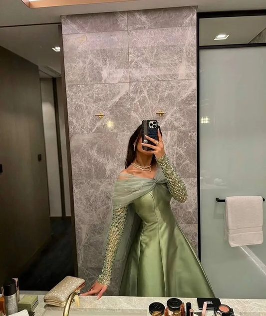 Elegante vestido de noche de satén con hombros descubiertos, mangas largas y brillantes en color cian, con lazo, estilo árabe, para fiesta de graduación y ocasiones formales.