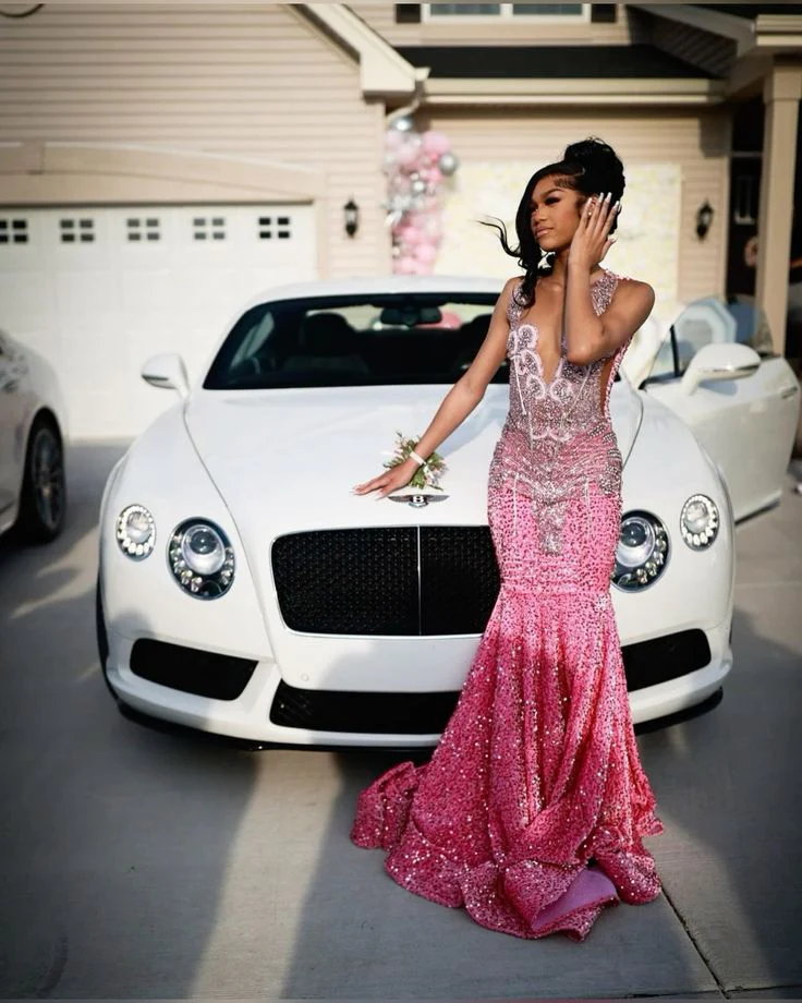 Belle robe de soirée sirène rose à paillettes et perles